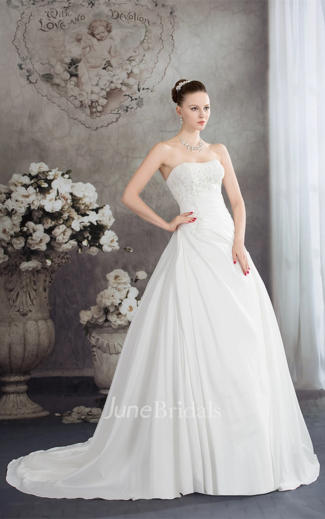 Strapless Appliqued Ball Gown with Beading and Ruching