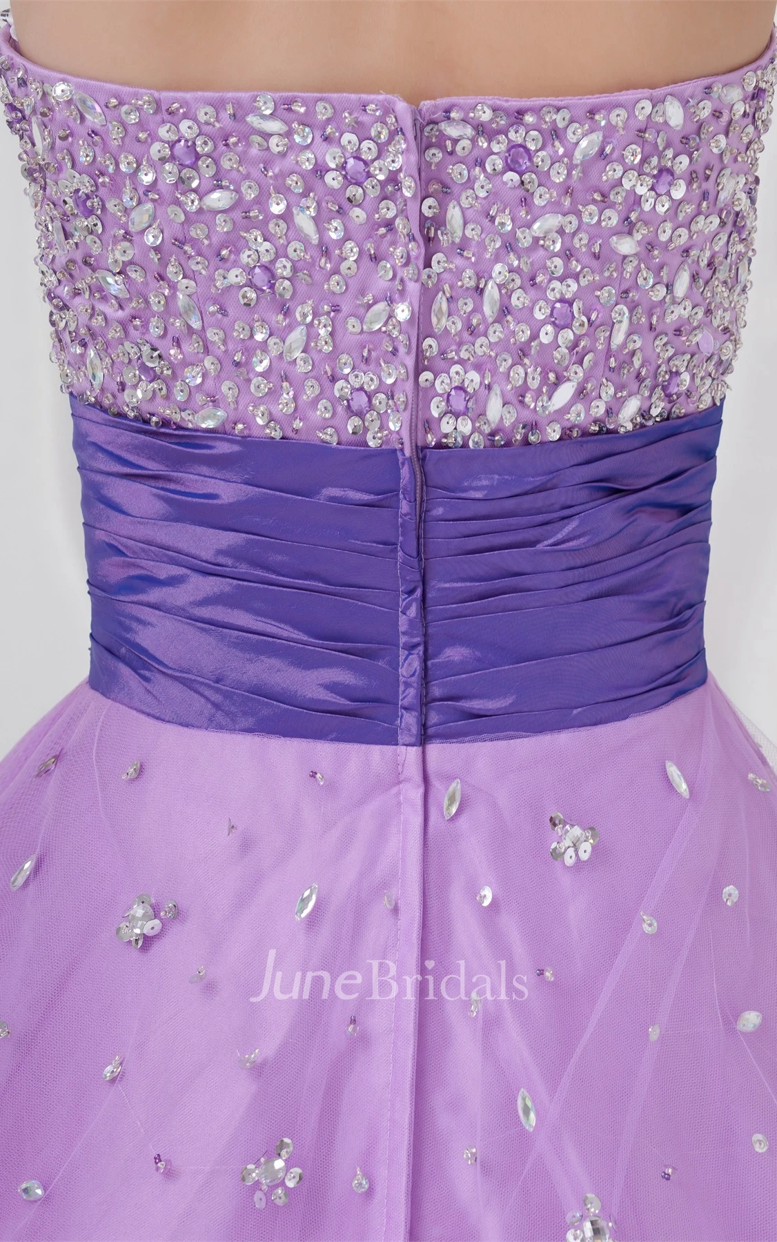 strapless a-line tulle dress with ruched waist and jeweled top