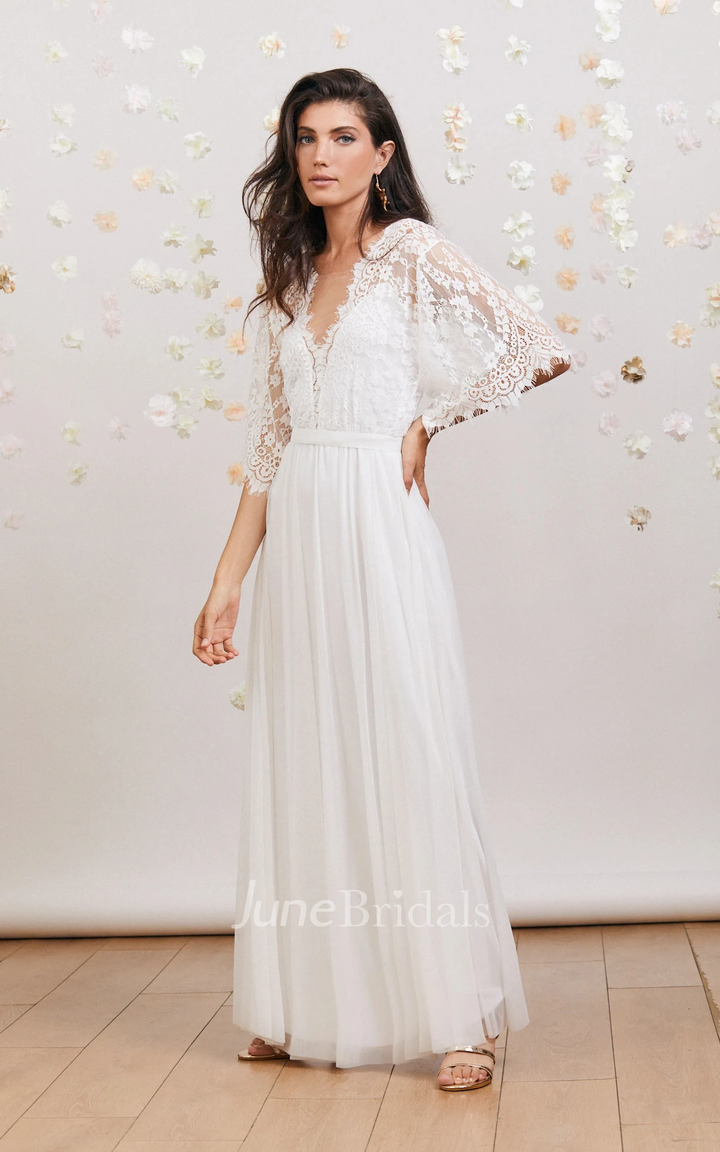 Elegant Romantic Bohemian Lace Spring Wedding Dress with Deep V Neck Open Back Flowy Bridal Gown