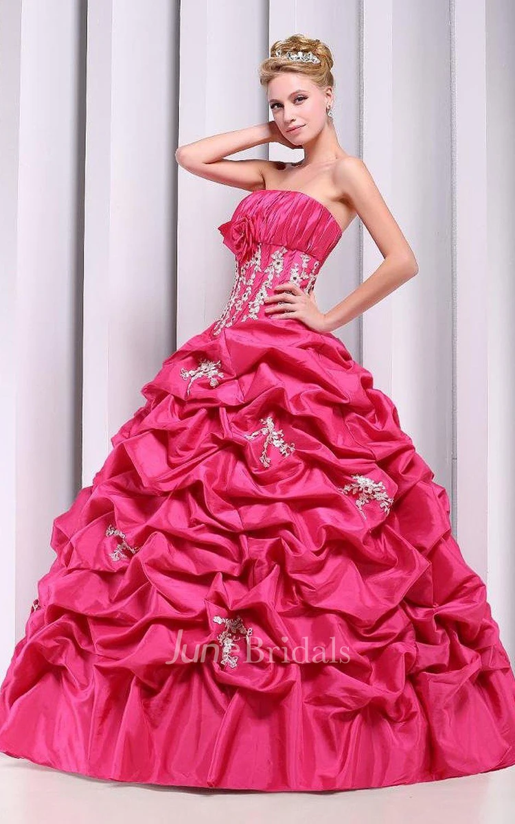 Strapless Ball Gown With Ruffles and Flower Detail