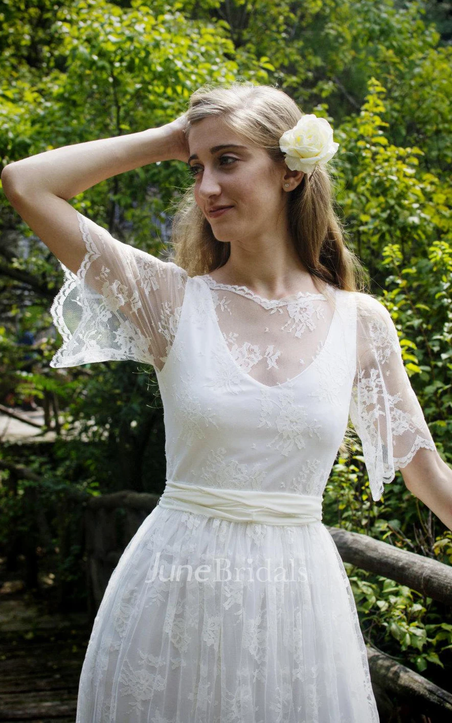 Jewel Bell Sleeve Illusion Back Long Tulle Wedding Dress With Beading And Bow