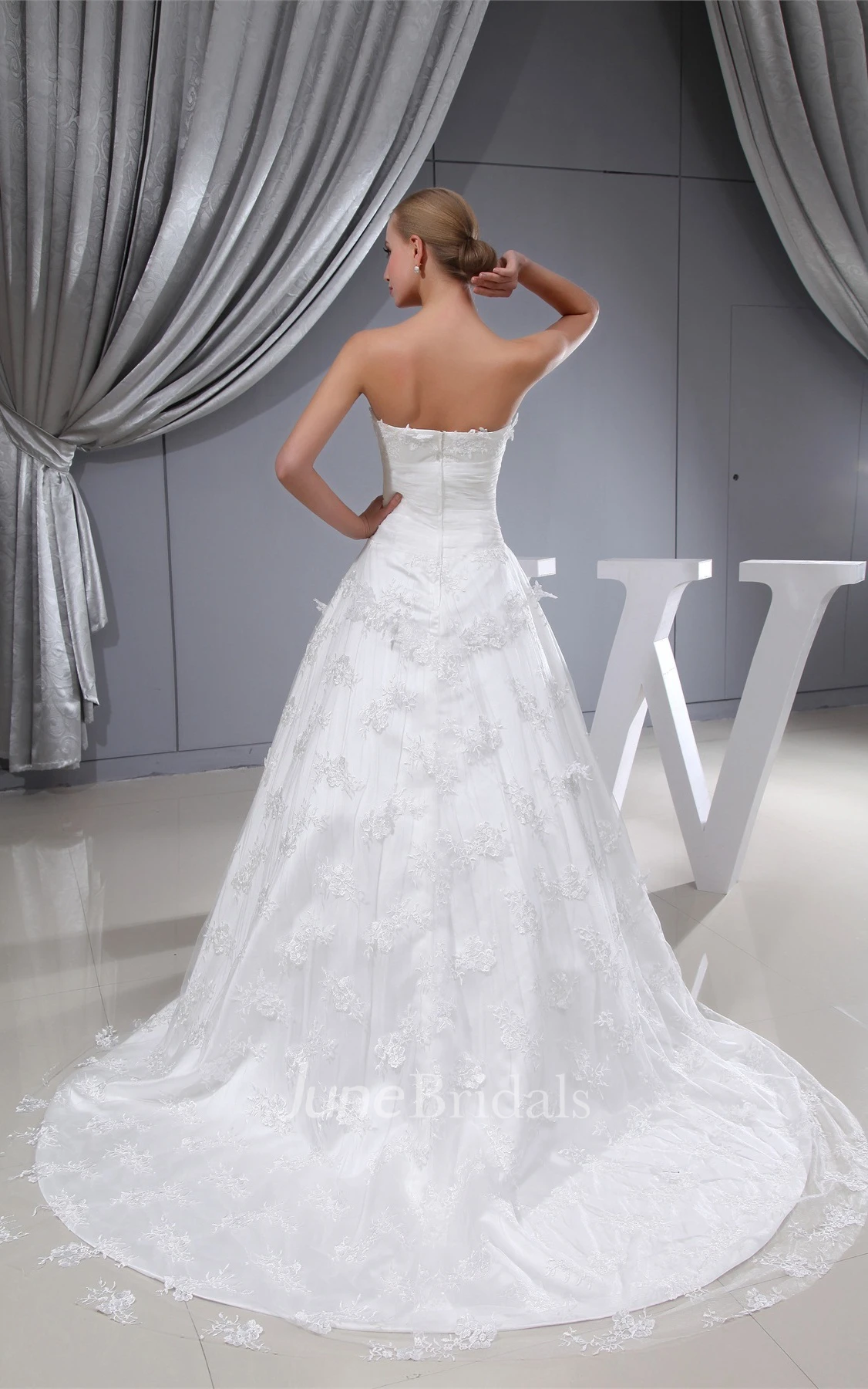 Long Strapless A-Line Lace Gown with Tulle Overlay and Cinched Waistband