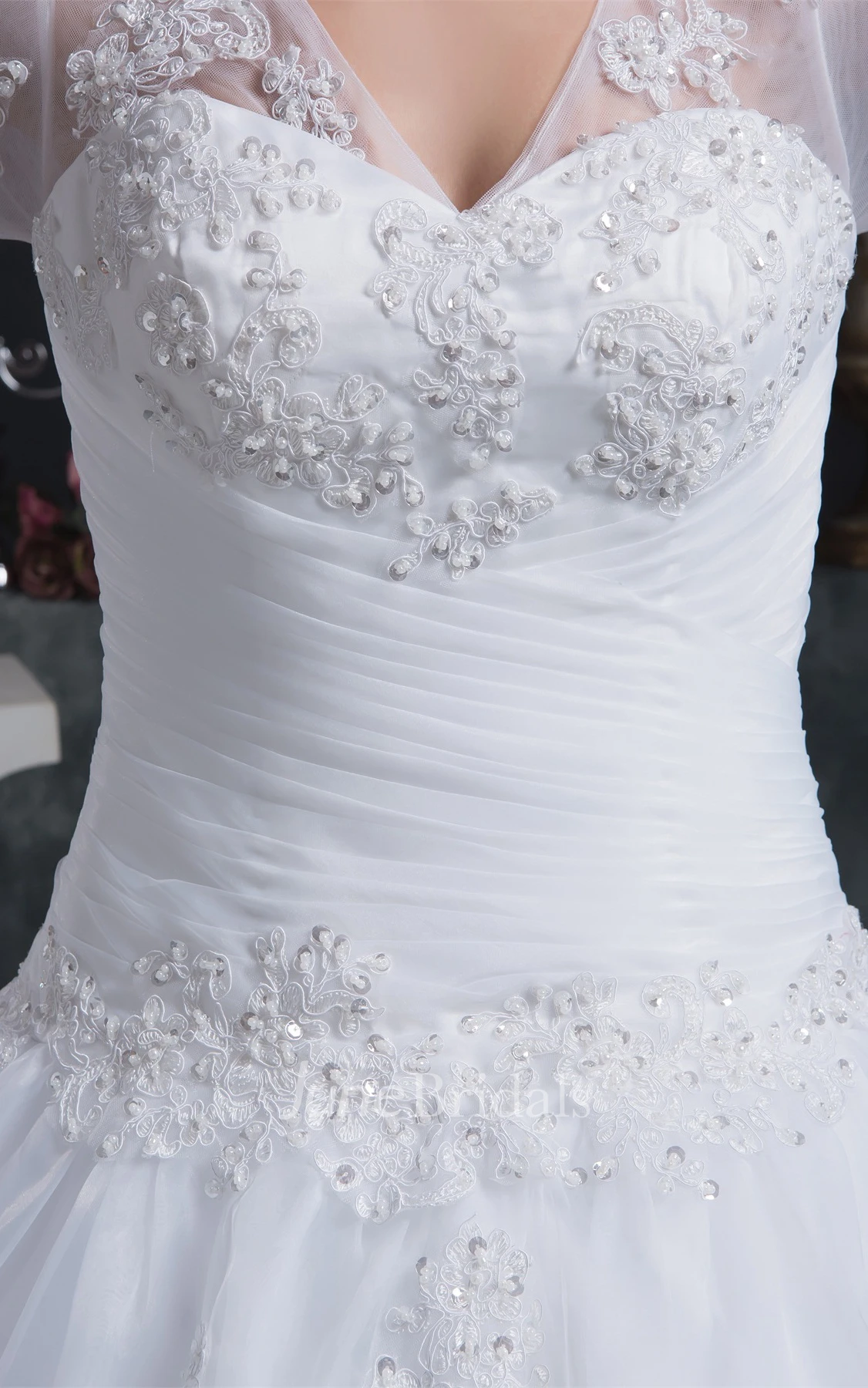 V-Neck Appliqued A-Line Gown with Ruching and Illusion Half Sleeve