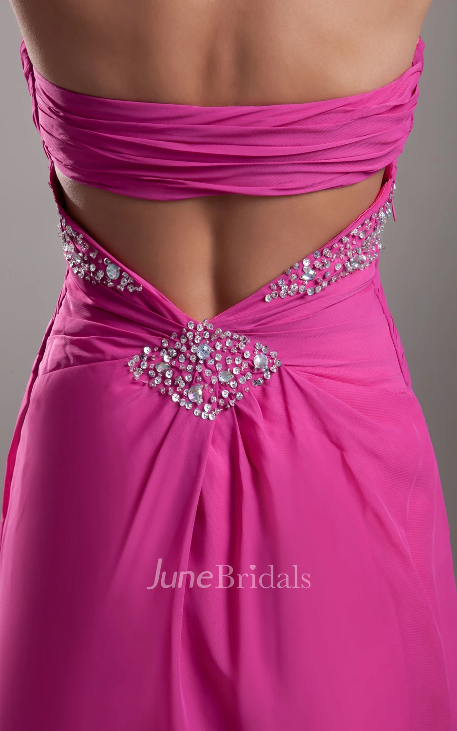 Soft Flowing Fabric Sweetheart Sleeveless Dress With Crystal Detailing And Draping