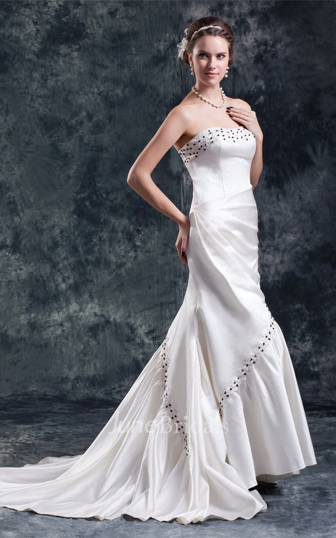strapless draped a-line satin gown with appliques and beading
