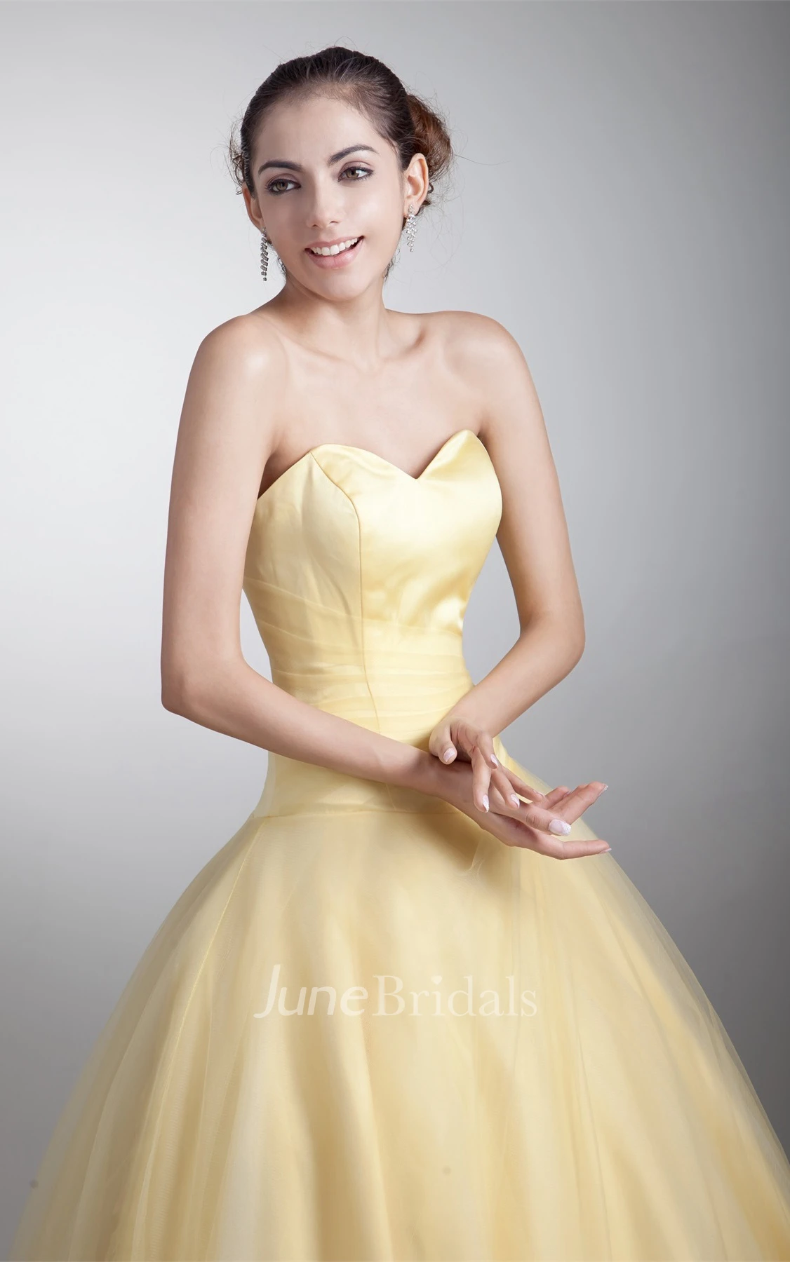 sweetheart a-line ball tulle gown with ruched waist and corset back