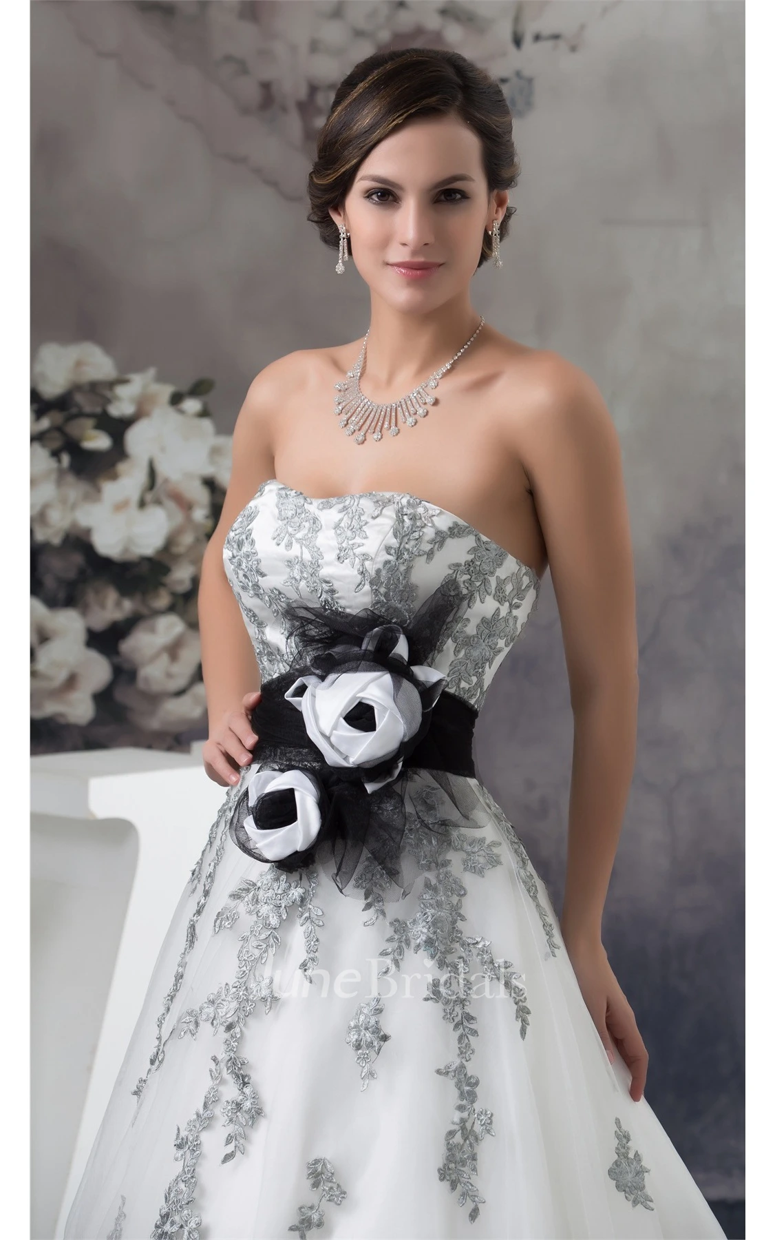 Strapless Appliqued Ball Gown with Flower and Tulle Overlay