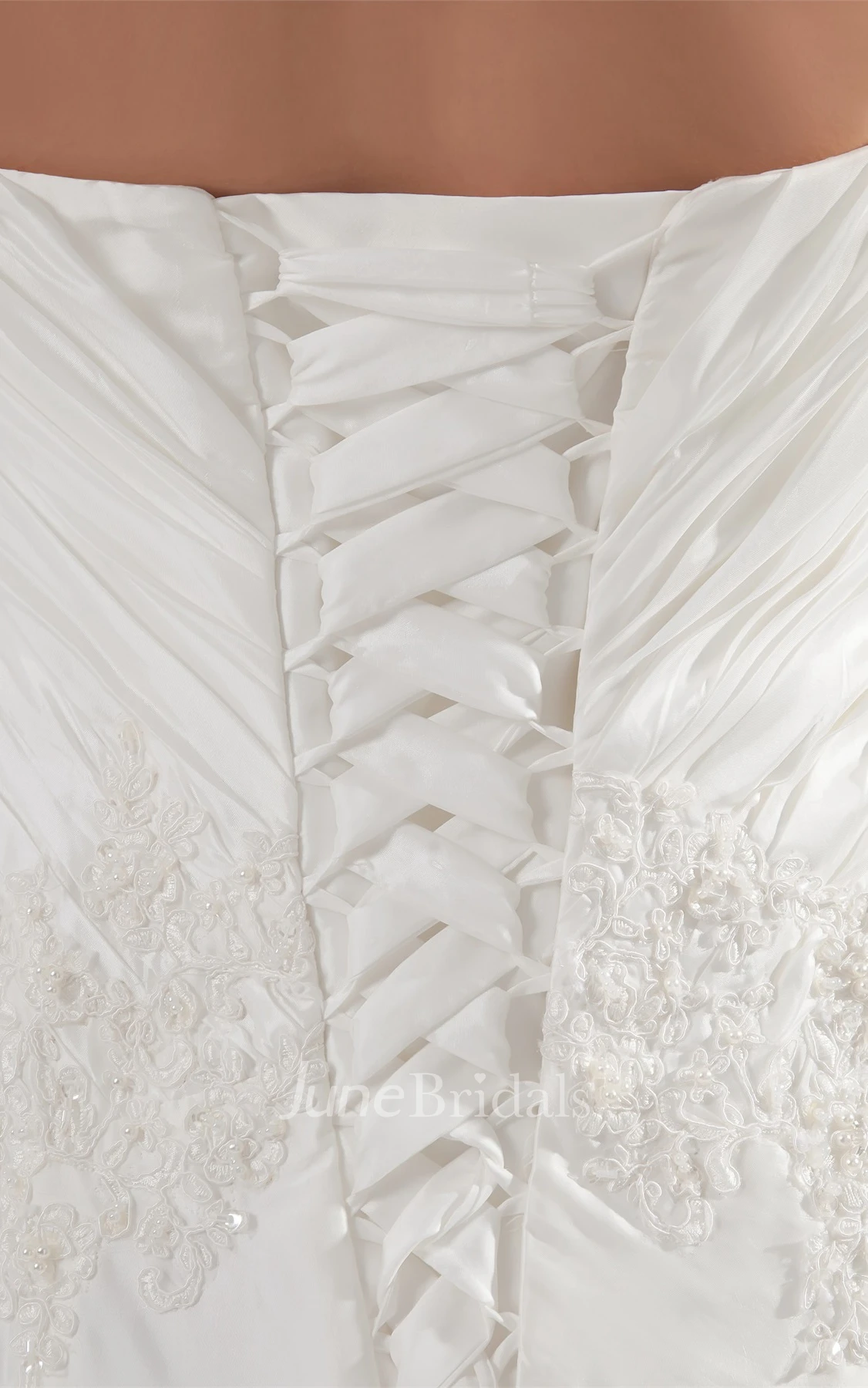 haltered a-line sleeveless gown with appliques and ruching