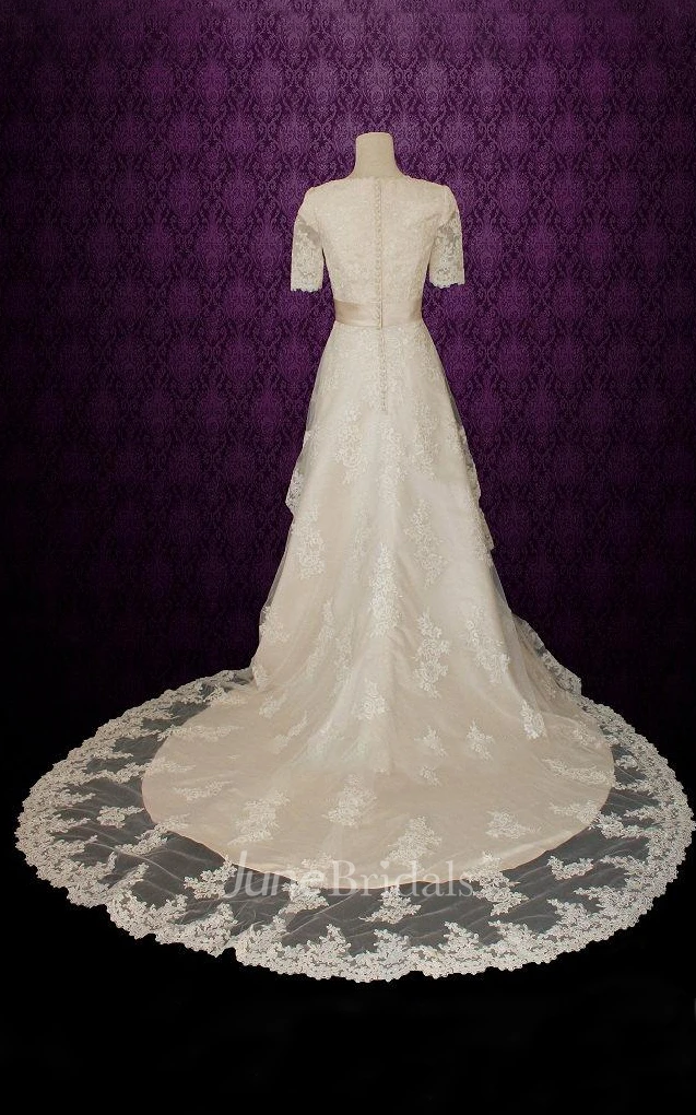 Jewel Button Back Lace Wedding Dress With Crystal Detailing And Tiers