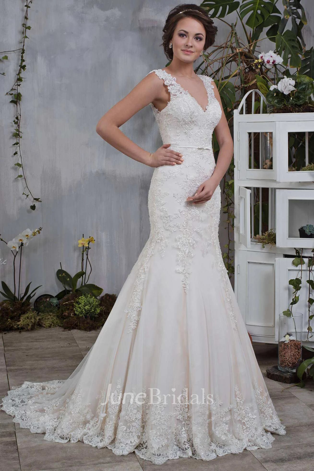Plunged Sleeveless Mermaid Wedding Dress With Appliques And Court Train