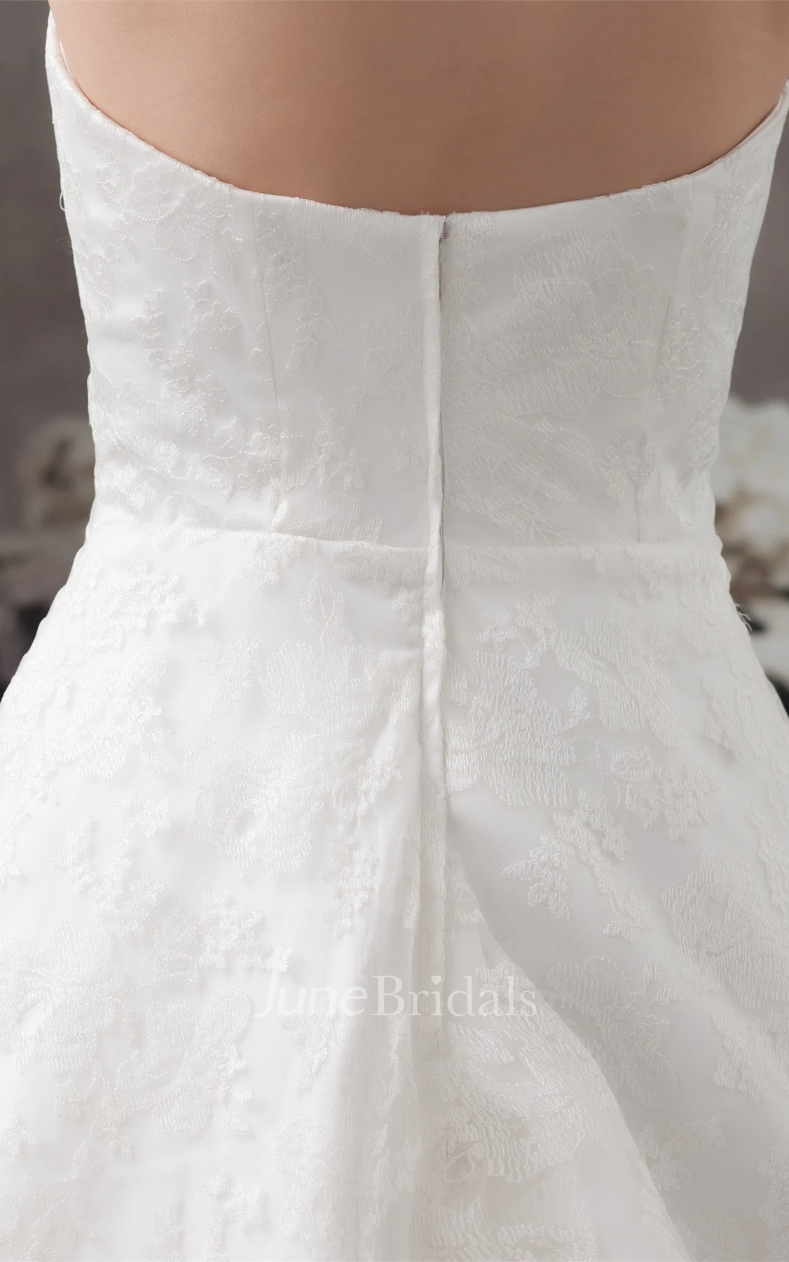 Sleeveless A-Line Appliqued Gown with Ruching and Halter