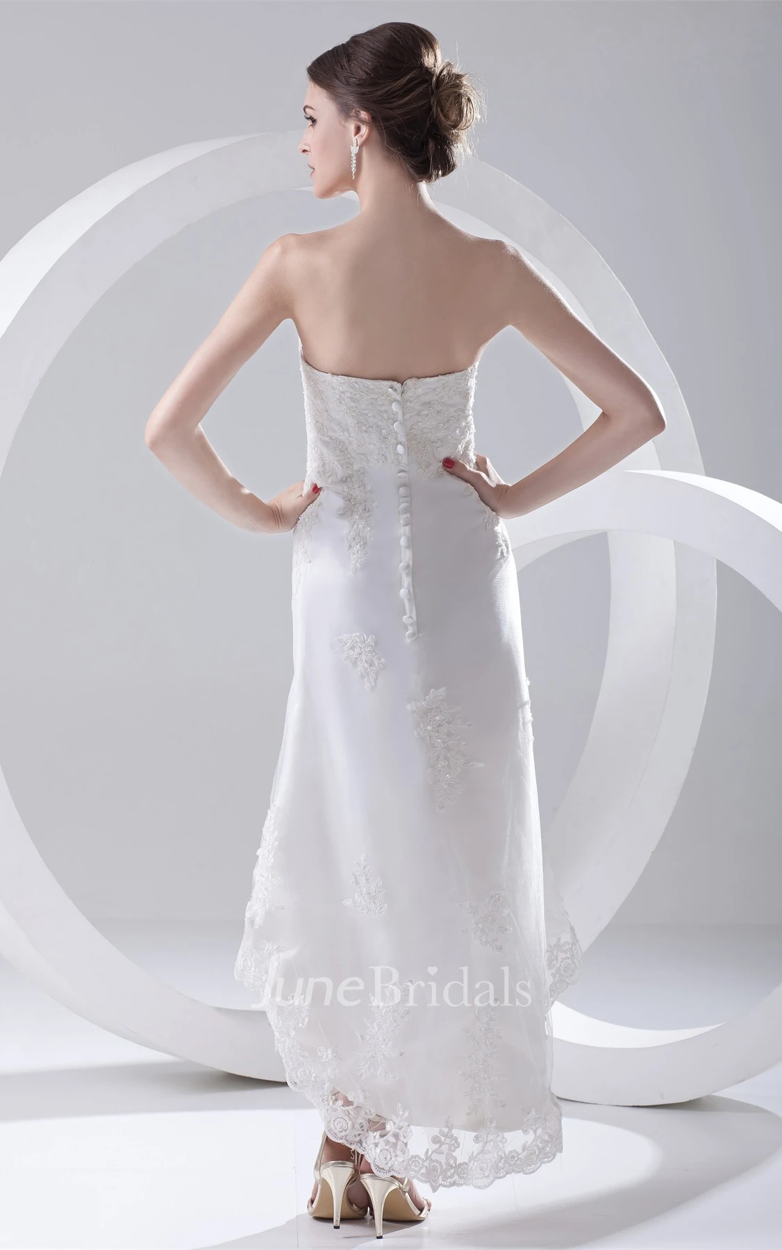 lace high-low strapless dress with crystal detailing