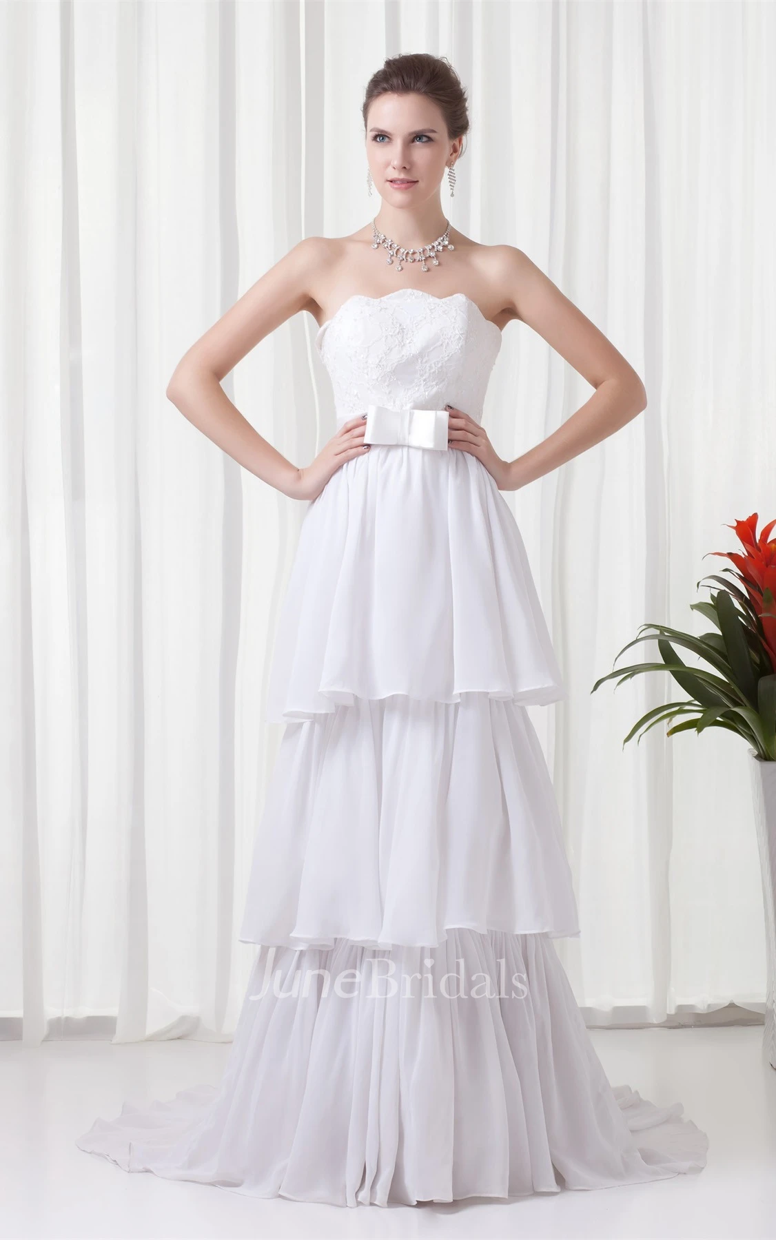 strapless tiered a-line dress with appliques and bow