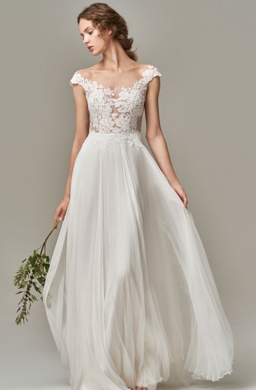 simple white flowy wedding dress
