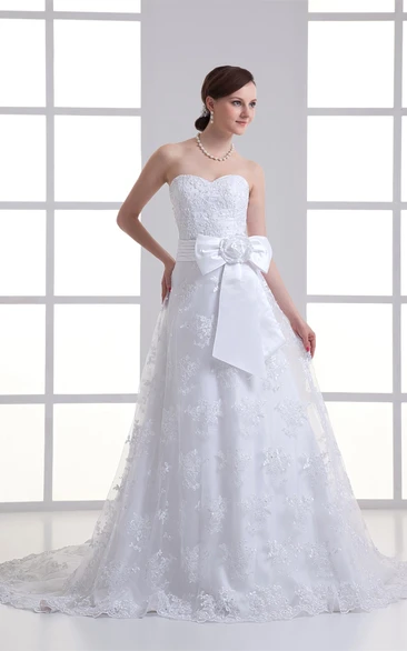 lace a-line floor-length strapless gown with court train and ribbon