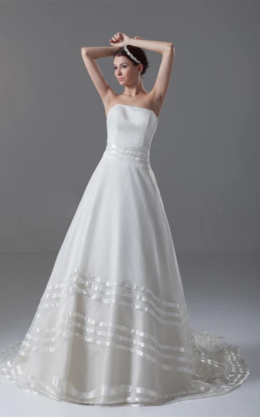 strapless ball a-line gown with backless design and court train