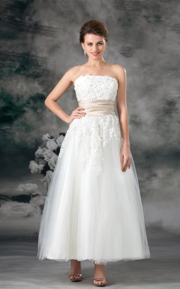 strapless a-line ankle-length gown with tulle overlay and appliques