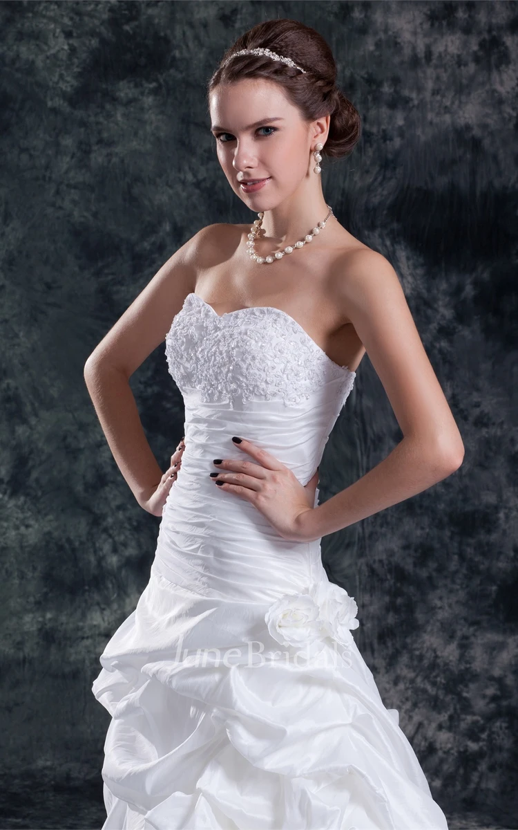 sweetheart a-line pick-up gown with ruched waist and appliques