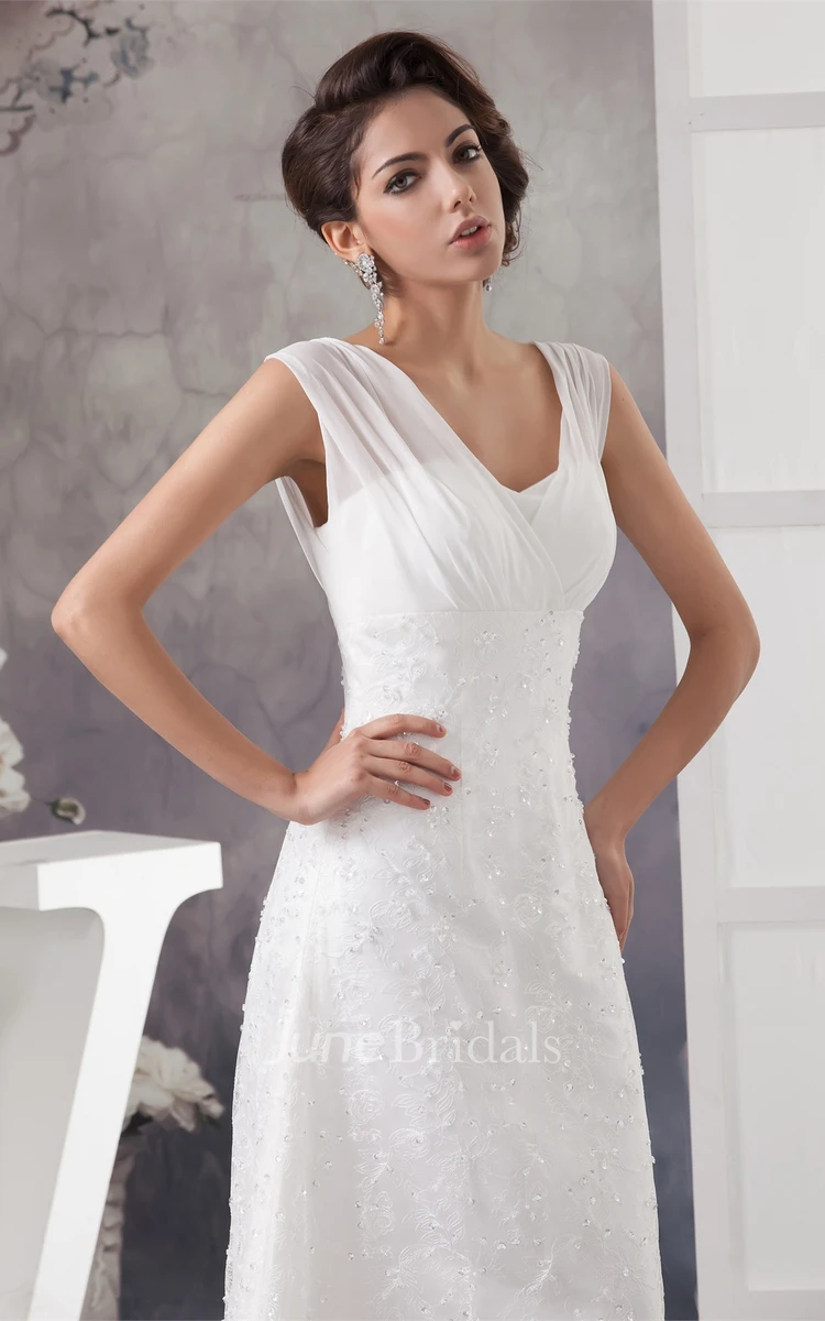 Strapped Appliqued Sheath Gown with Brush Train