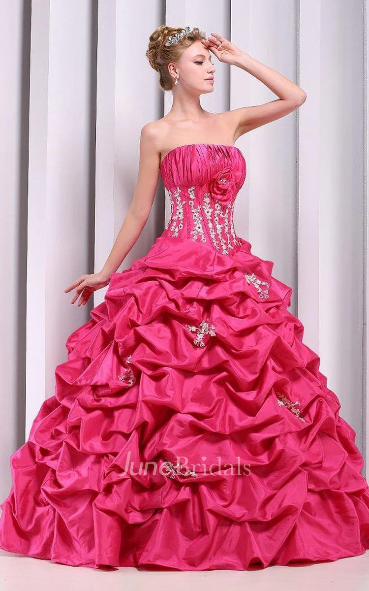 Strapless Ball Gown With Ruffles and Flower Detail