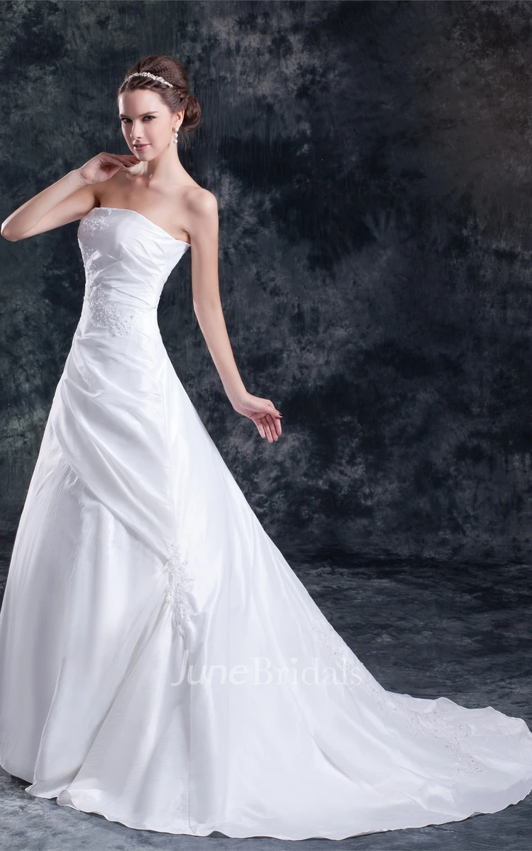 strapless a-line gown with corset back and appliques