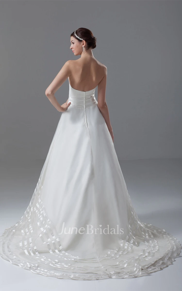 strapless ball a-line gown with backless design and court train