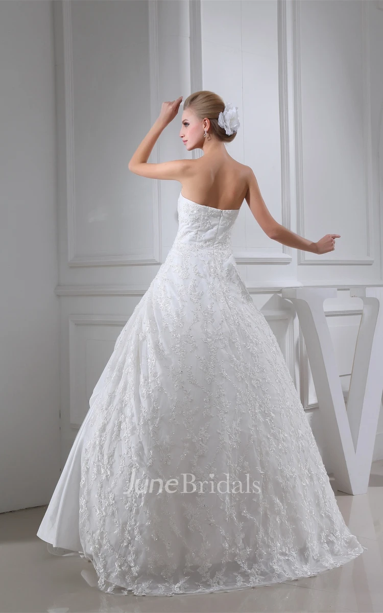 Strapless Appliqued Ball Gown with Ruching and Side Draping