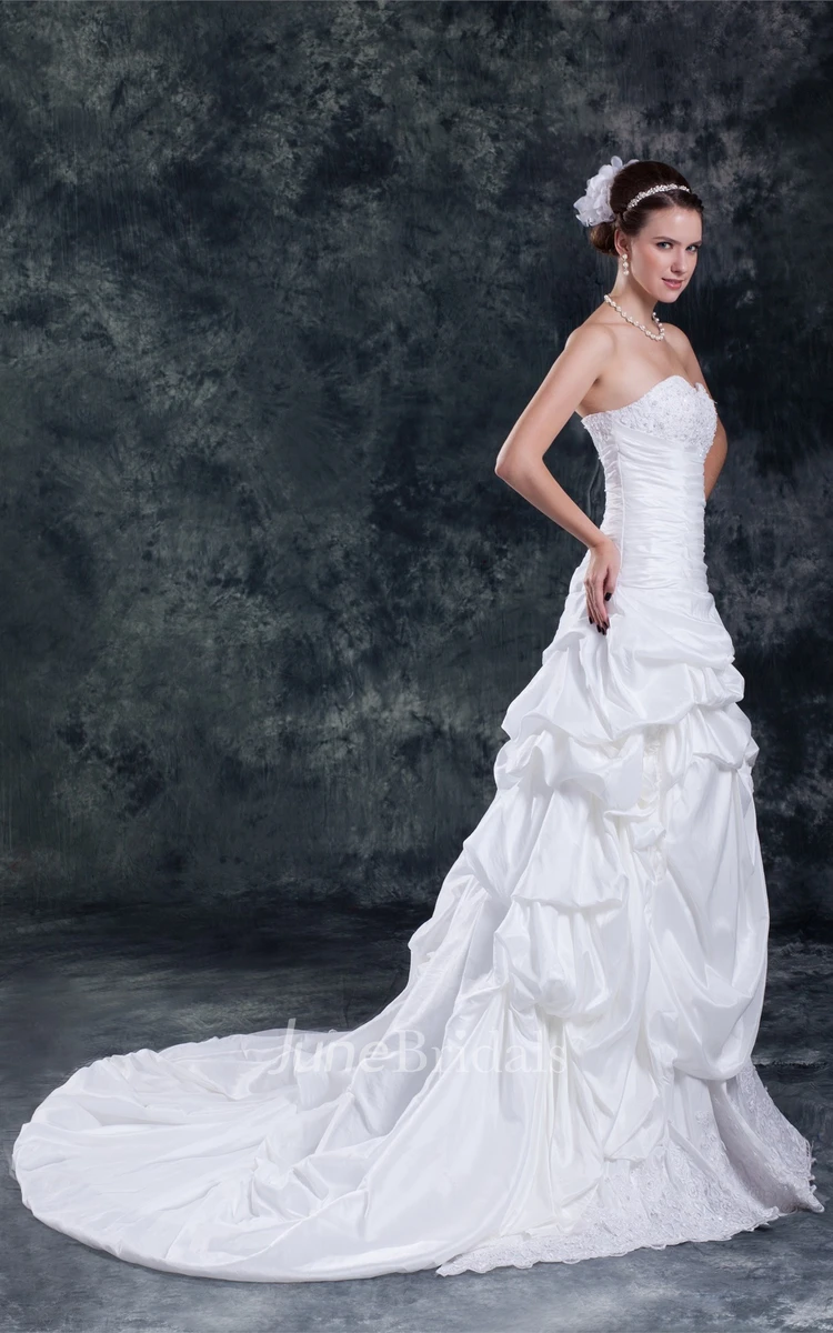 sweetheart a-line pick-up gown with ruched waist and appliques