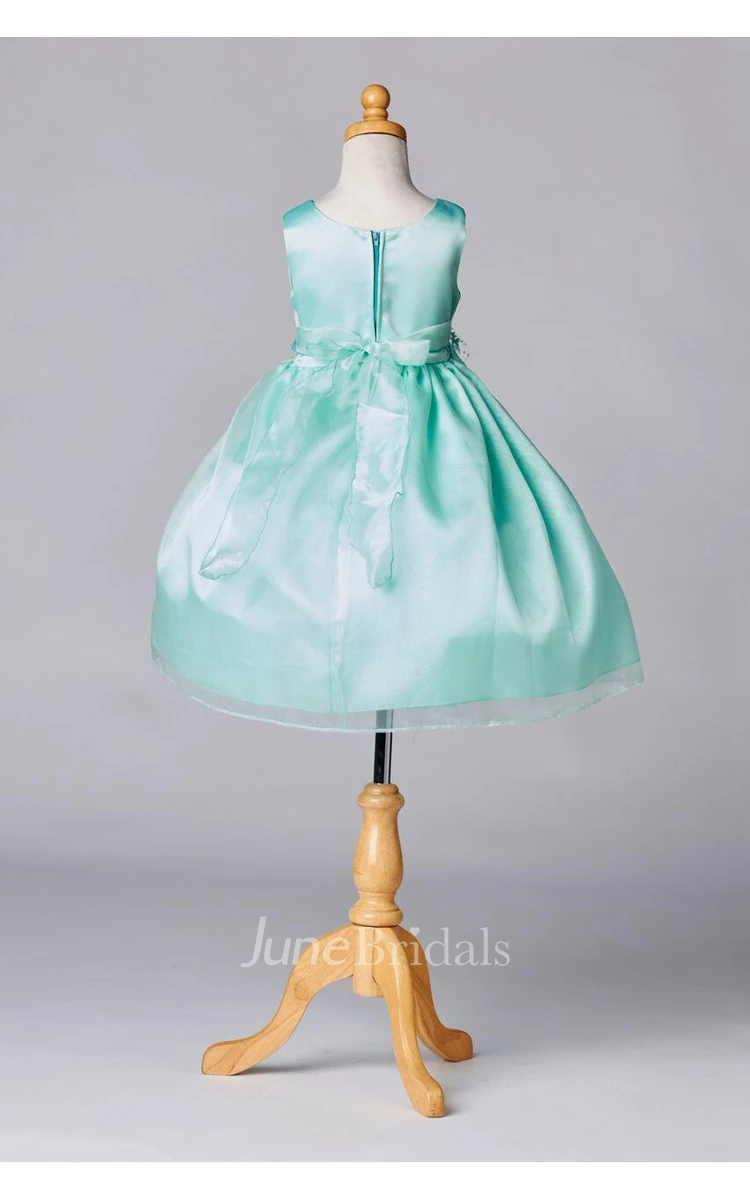 Sleeveless Jewel Neck Satin Organza Layered Skirt With Flower Waistline