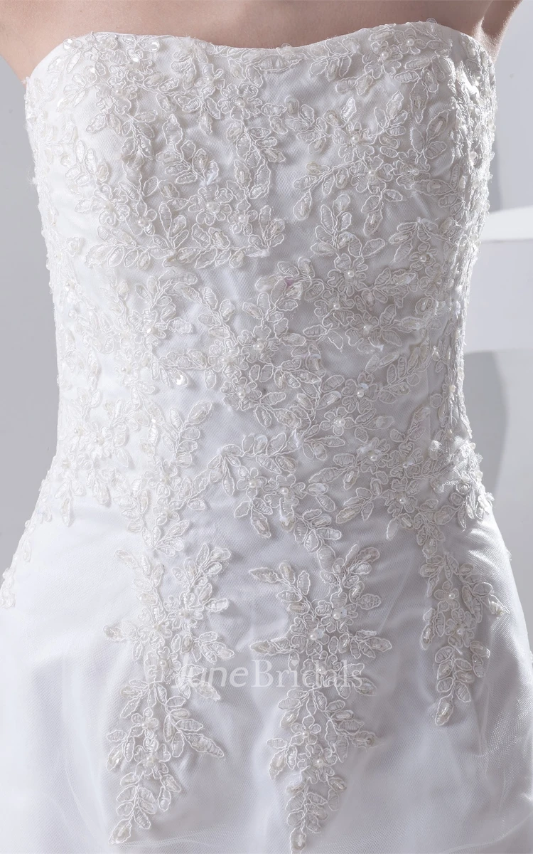 lace high-low strapless dress with crystal detailing