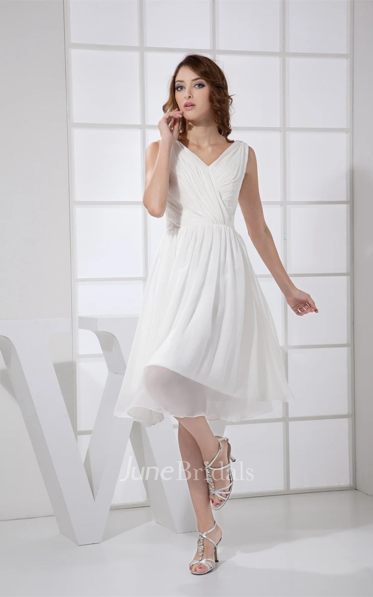 Sleeveless Low-V-Back Knee-Length Dress with Ruching and Pleats