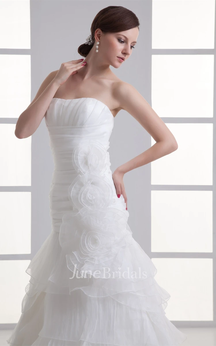 strapless a-line ball tiered gown with floral embellishment